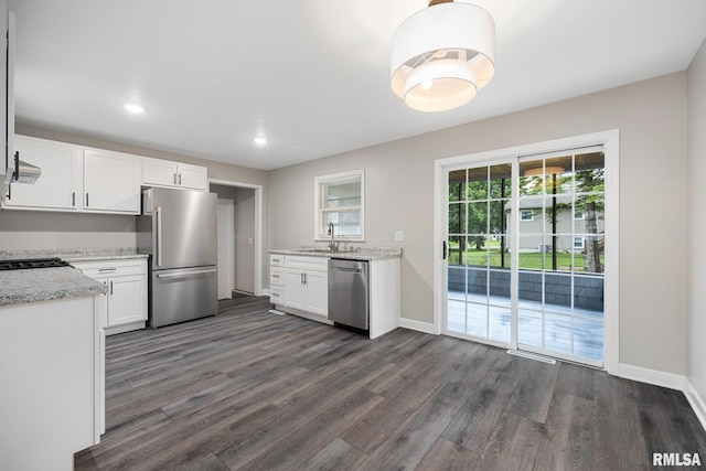 208 W Graze Ave, Dunlap, IL 61525 - kitchen featuring appliances with stainless steel finishes, dark wood-style flooring, white cabinetry, light stone counters, and recessed lighting