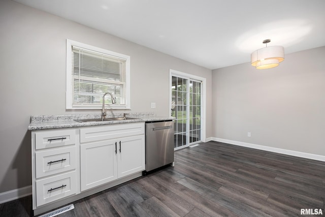 208 W Graze Ave, Dunlap, IL 61525 - kitchen with stainless steel dishwasher, dark wood finished floors, white cabinets, light stone counters, and pendant lighting
