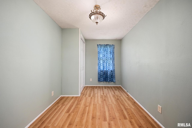 1013 N 2nd St, Pekin, IL 61554 - unfurnished room featuring light wood-type flooring