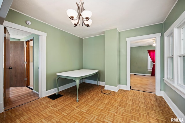 1013 N 2nd St, Pekin, IL 61554 - dining space featuring a chandelier and ornamental molding