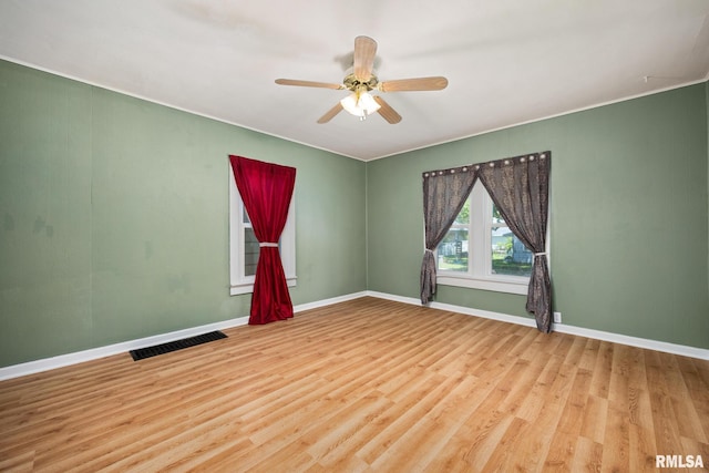 1013 N 2nd St, Pekin, IL 61554 - empty room featuring wood finished floors and ceiling fan