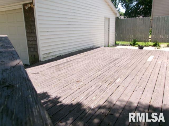 102 N Park Ave, Manito, IL 61546 - wooden deck featuring a garage