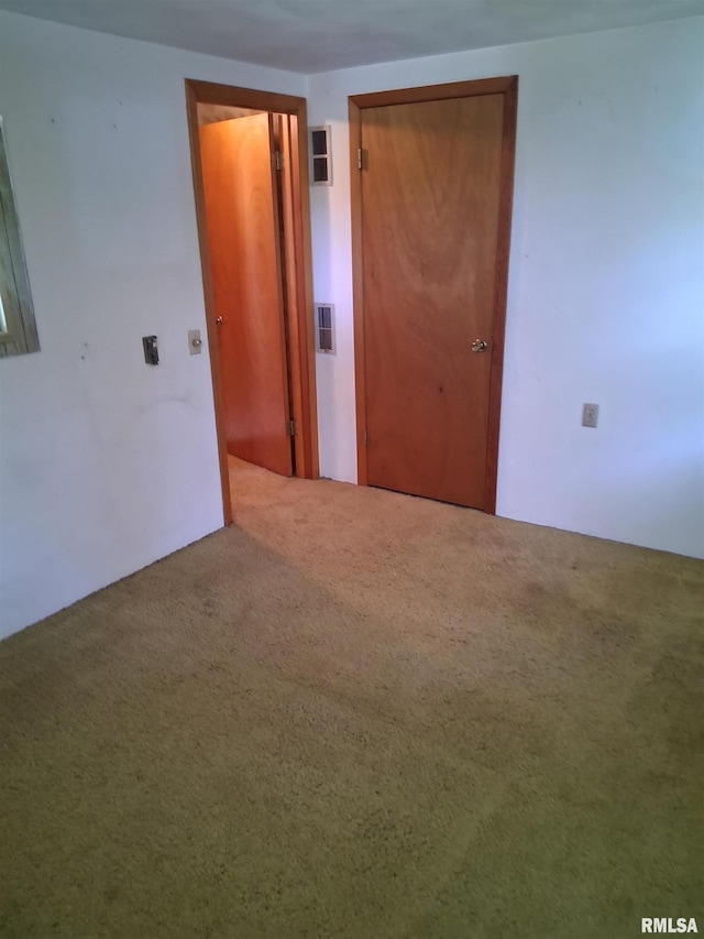 102 N Park Ave, Manito, IL 61546 - spare room featuring carpet flooring