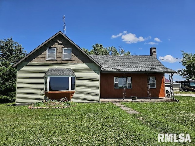 19635 E 800th St, Sciota, IL 61475 - back of house featuring a yard and a chimney