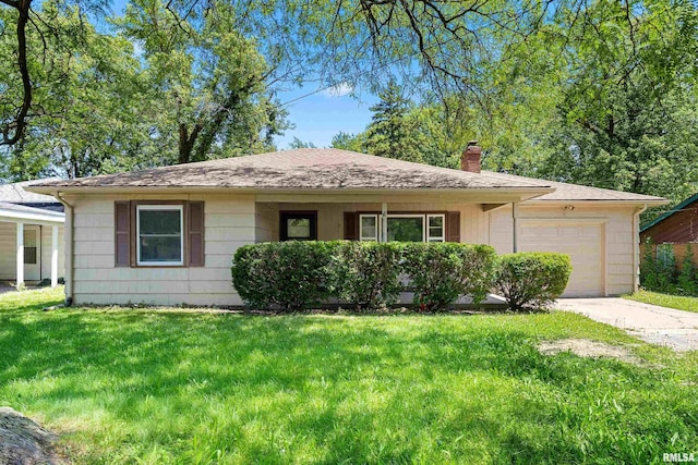 1726 N Pierson Dr, West Peoria, IL 61604 - single story home featuring a garage, a chimney, driveway, and a front lawn