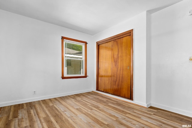 1726 N Pierson Dr, West Peoria, IL 61604 - empty room featuring light wood finished floors