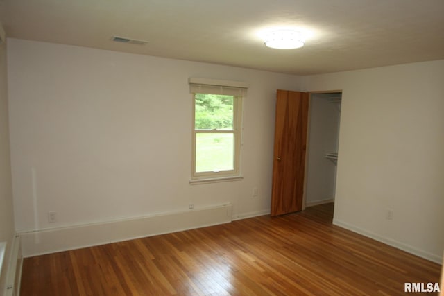 29724 Allentown Rd, Mackinaw, IL 61755 - unfurnished room with wood finished floors and baseboards
