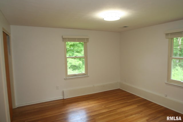 29724 Allentown Rd, Mackinaw, IL 61755 - spare room featuring wood finished floors and baseboards