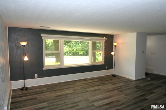 29724 Allentown Rd, Mackinaw, IL 61755 - spare room featuring wood finished floors and baseboards