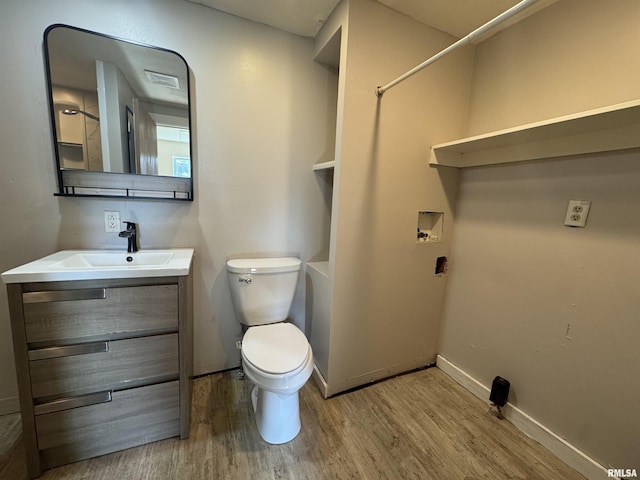 1406 6th St, Pekin, IL 61554 - full bathroom featuring wood finished floors, vanity, and bathtub / shower combination