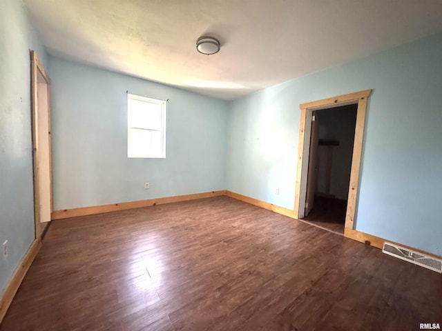 1406 6th St, Pekin, IL 61554 - unfurnished bedroom featuring wood finished floors