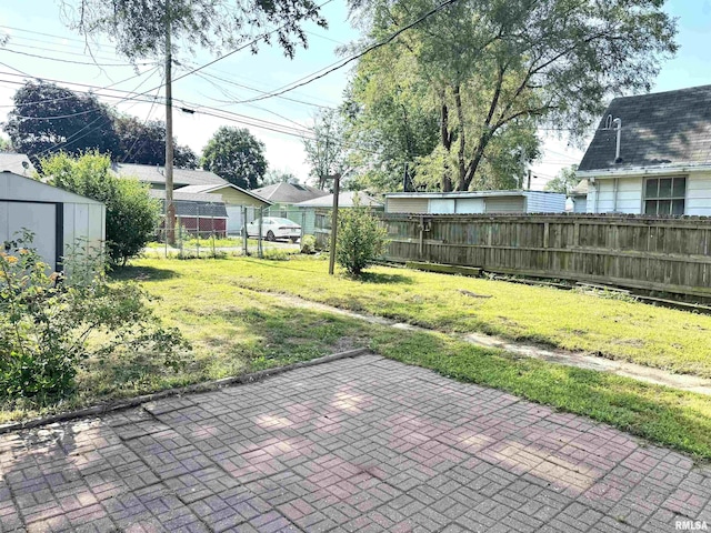 1406 6th St, Pekin, IL 61554 - view of patio with a shed