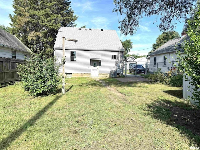 1406 6th St, Pekin, IL 61554 - rear view of house with roof with shingles