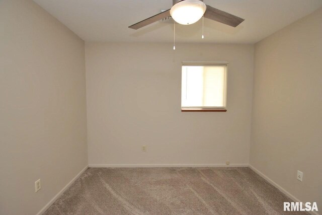 1409 Alton St, Pekin, IL 61554 - unfurnished room featuring carpet floors and ceiling fan