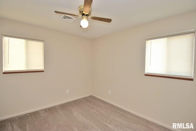 1409 Alton St, Pekin, IL 61554 - unfurnished room with ceiling fan and carpet flooring