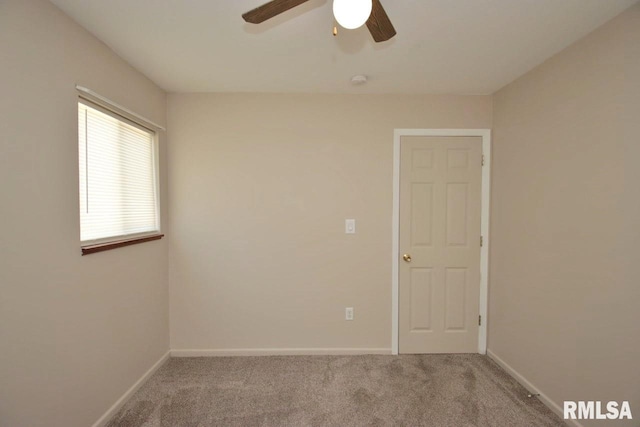 1409 Alton St, Pekin, IL 61554 - empty room with carpet floors and ceiling fan