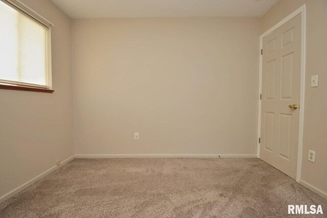 1409 Alton St, Pekin, IL 61554 - carpeted spare room with baseboards