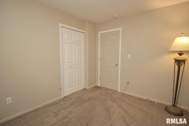 1409 Alton St, Pekin, IL 61554 - empty room featuring carpet flooring and baseboards