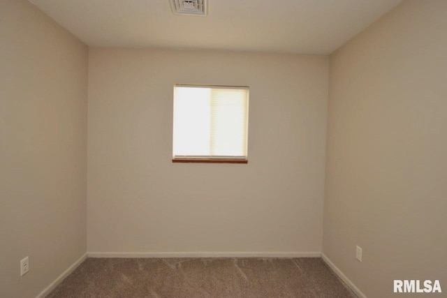 1409 Alton St, Pekin, IL 61554 - spare room featuring carpet