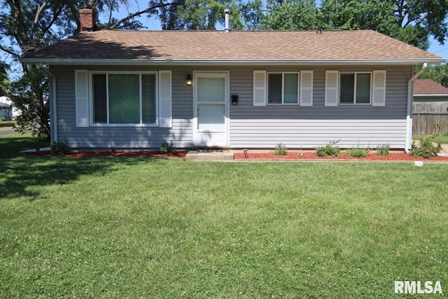 1409 Alton St, Pekin, IL 61554 - ranch-style home featuring a chimney and a shingled roof