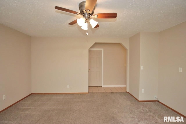 1409 Alton St, Pekin, IL 61554 - additional living space with a ceiling fan, carpet floors, and a textured ceiling