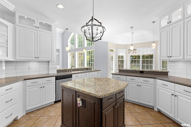 4851 Sheridan Rd, Groveland, IL 61535 - kitchen with dishwasher, a peninsula, a chandelier, recessed lighting, and light tile patterned floors