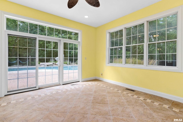 4851 Sheridan Rd, Groveland, IL 61535 - empty room with tile patterned floors, ceiling fan, and recessed lighting