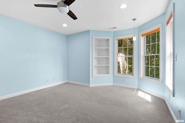 4851 Sheridan Rd, Groveland, IL 61535 - spare room with ceiling fan, carpet floors, recessed lighting, and built in shelves
