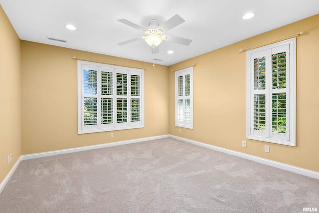 4851 Sheridan Rd, Groveland, IL 61535 - unfurnished room featuring carpet, a ceiling fan, and recessed lighting