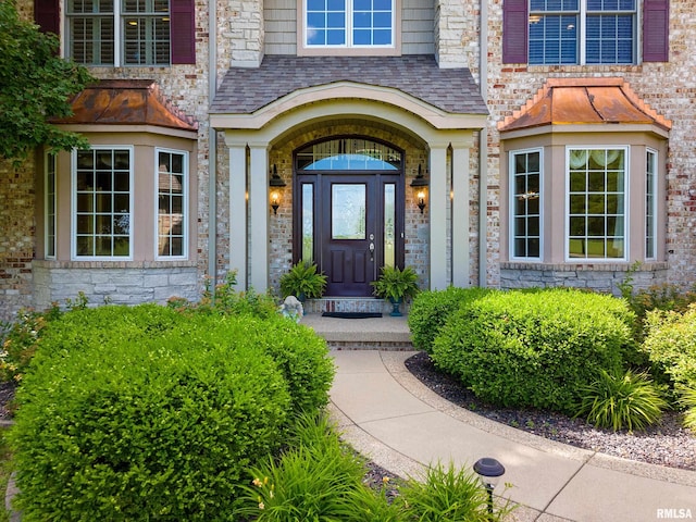 4851 Sheridan Rd, Groveland, IL 61535 - view of exterior entry with a high end roof and brick siding