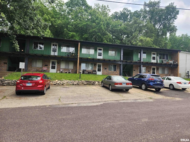 740 E Shore Dr Unit 8, Pekin, IL 61554 - view of building exterior with uncovered parking