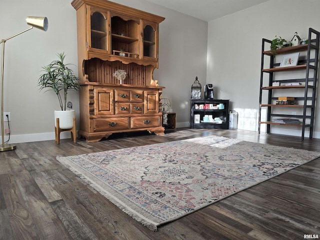 1704 Heisel Ave, Pekin, IL 61554 - sitting room with dark wood-style floors and baseboards