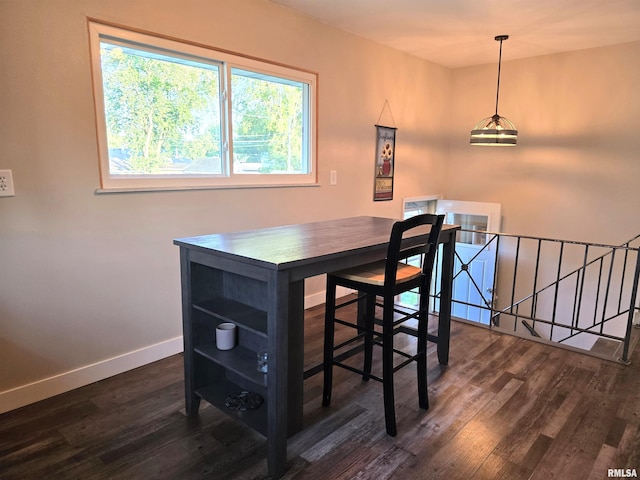 1704 Heisel Ave, Pekin, IL 61554 - dining space featuring dark wood finished floors and baseboards