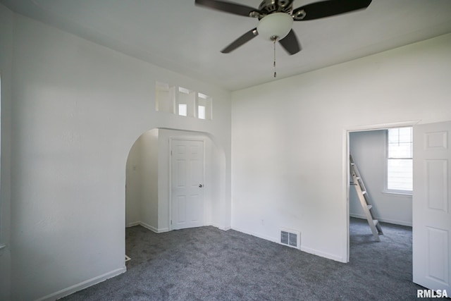 1107 E Frye Ave, Peoria, IL 61603 - carpeted spare room featuring arched walkways and ceiling fan
