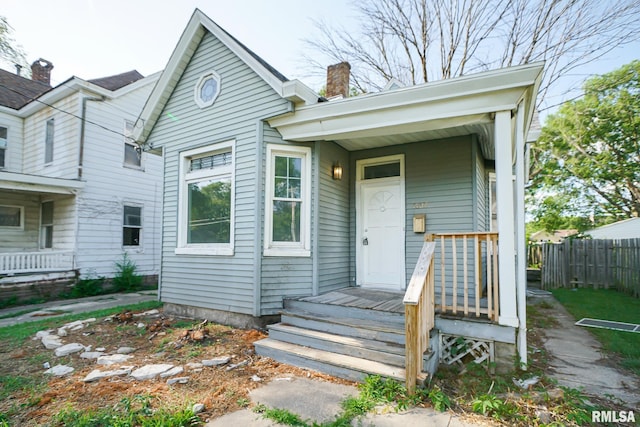1107 E Frye Ave, Peoria, IL 61603 - shotgun-style home with a chimney