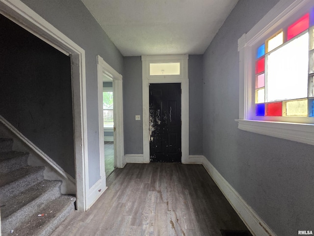 2011 N Bigelow St, Peoria, IL 61604 - entryway featuring wood finished floors and stairs