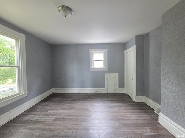 2011 N Bigelow St, Peoria, IL 61604 - empty room with wood finished floors and baseboards