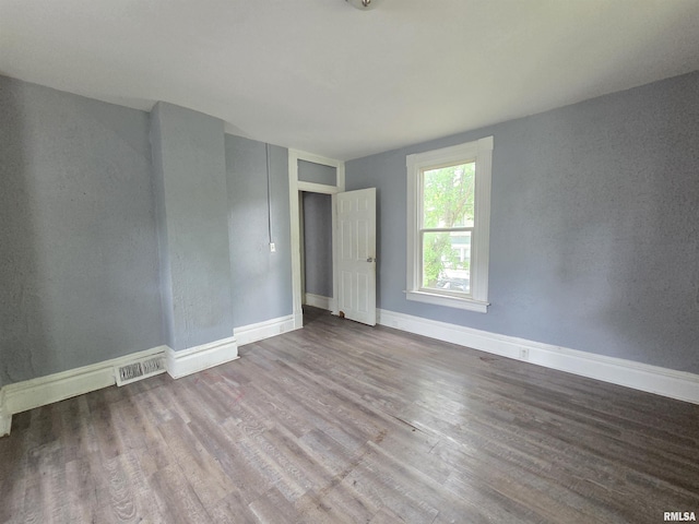 2011 N Bigelow St, Peoria, IL 61604 - empty room with wood finished floors and baseboards