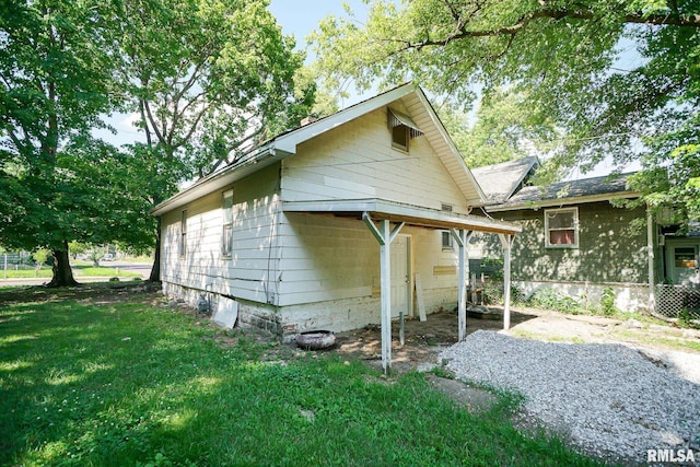 2320 W Krause Ave, Peoria, IL 61605 - view of home's exterior featuring a lawn