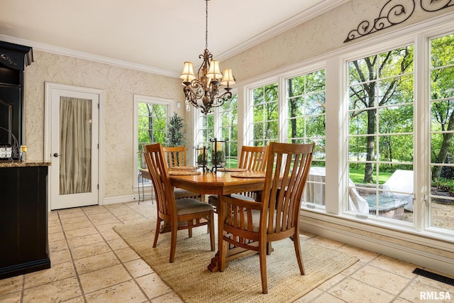 2204 W Pinnacle Dr, Dunlap, IL 61525 - dining room with ornamental molding, stone tile floors, and a chandelier