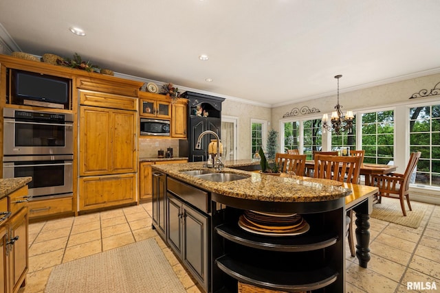 2204 W Pinnacle Dr, Dunlap, IL 61525 - kitchen with stainless steel appliances, crown molding, healthy amount of natural light, a chandelier, and brown cabinets