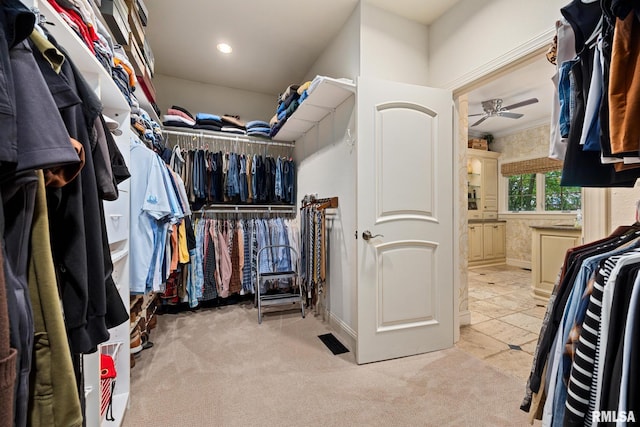 2204 W Pinnacle Dr, Dunlap, IL 61525 - spacious closet with a ceiling fan and carpet