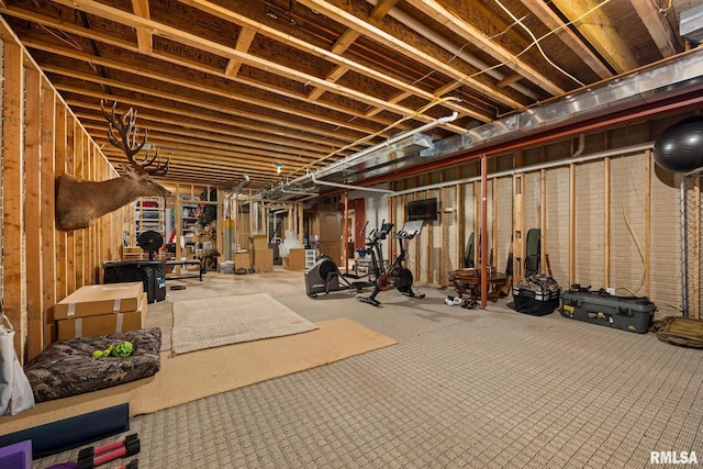 2204 W Pinnacle Dr, Dunlap, IL 61525 - unfinished below grade area with carpet flooring
