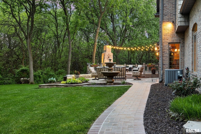 2204 W Pinnacle Dr, Dunlap, IL 61525 - view of green lawn with a patio