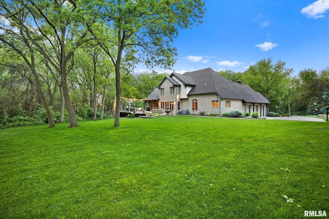 2204 W Pinnacle Dr, Dunlap, IL 61525 - view of front of home featuring a front yard and a chimney