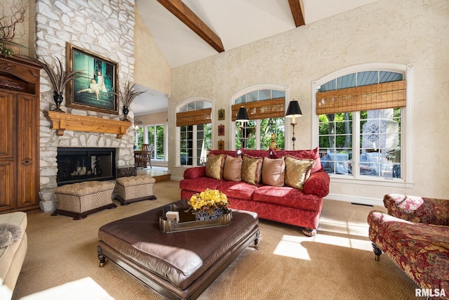 2204 W Pinnacle Dr, Dunlap, IL 61525 - carpeted living area featuring a stone fireplace, high vaulted ceiling, and beam ceiling