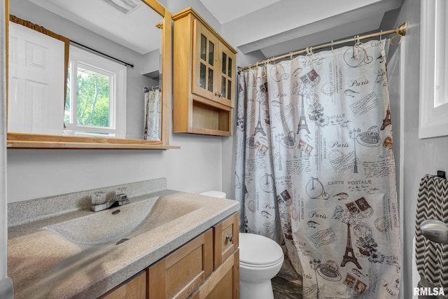 2816 N Kingston Dr, Peoria, IL 61604 - bathroom with vanity and a shower with shower curtain