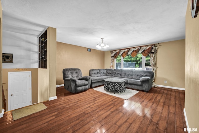 2816 N Kingston Dr, Peoria, IL 61604 - living room featuring hardwood / wood-style flooring and a chandelier