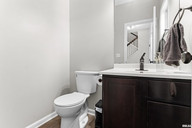 1604 Savile Ln, Washington, IL 61571 - half bathroom with vanity and wood finished floors