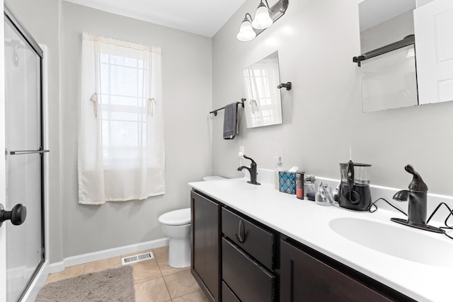 1604 Savile Ln, Washington, IL 61571 - bathroom featuring a shower stall, double vanity, and tile patterned floors